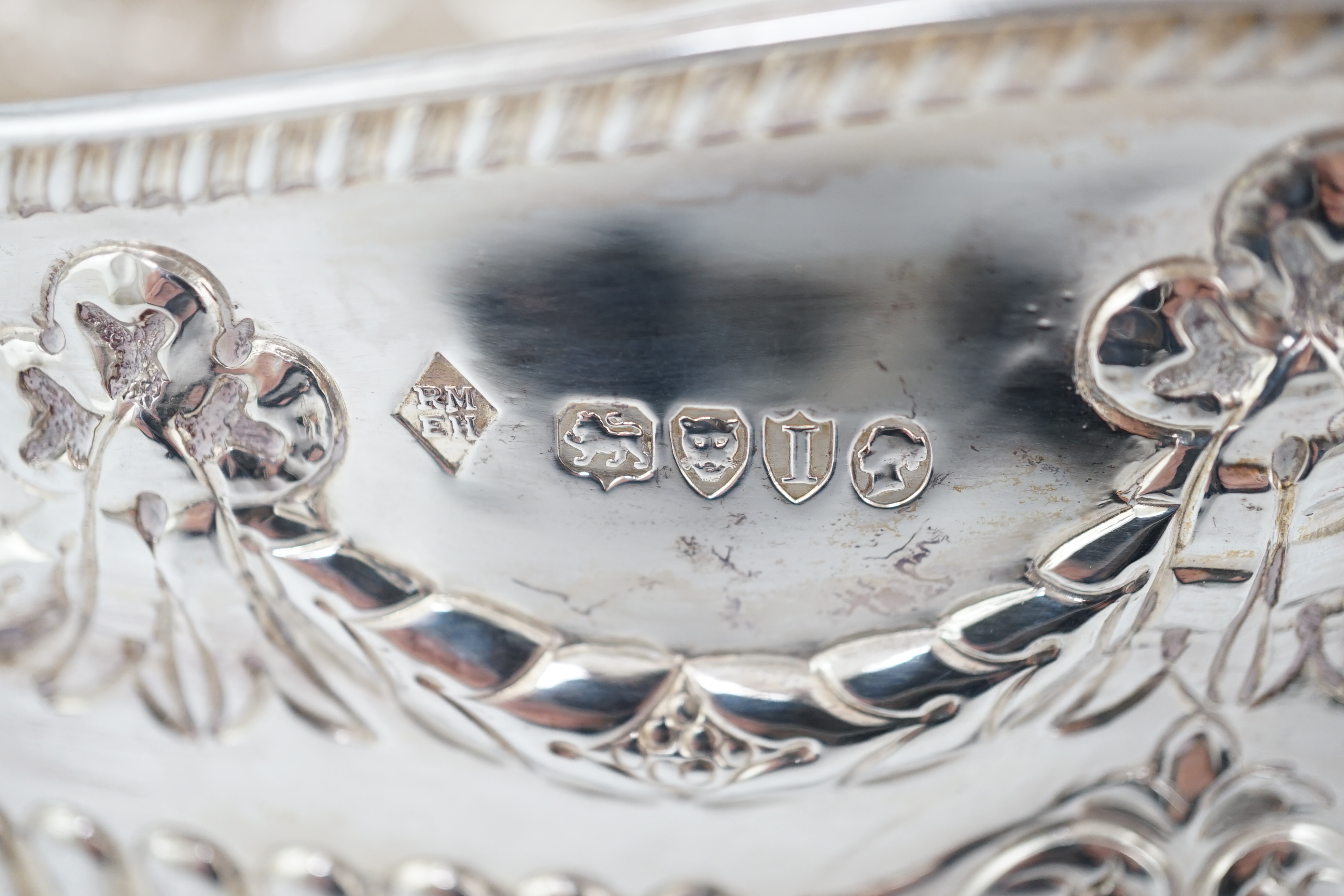 A late Victorian demi-fluted silver oval fruit bowl, by Martin, Hall & Co